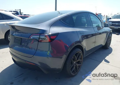 2023 Tesla Model Y Performance Dual Motor All-Wheel Drive z USA, uszkodzony, nr VIN 7SAYGDEF3PF968983